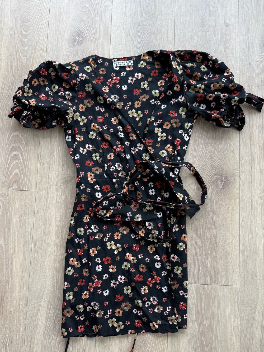 The Westside Black Floral Wrap Dress